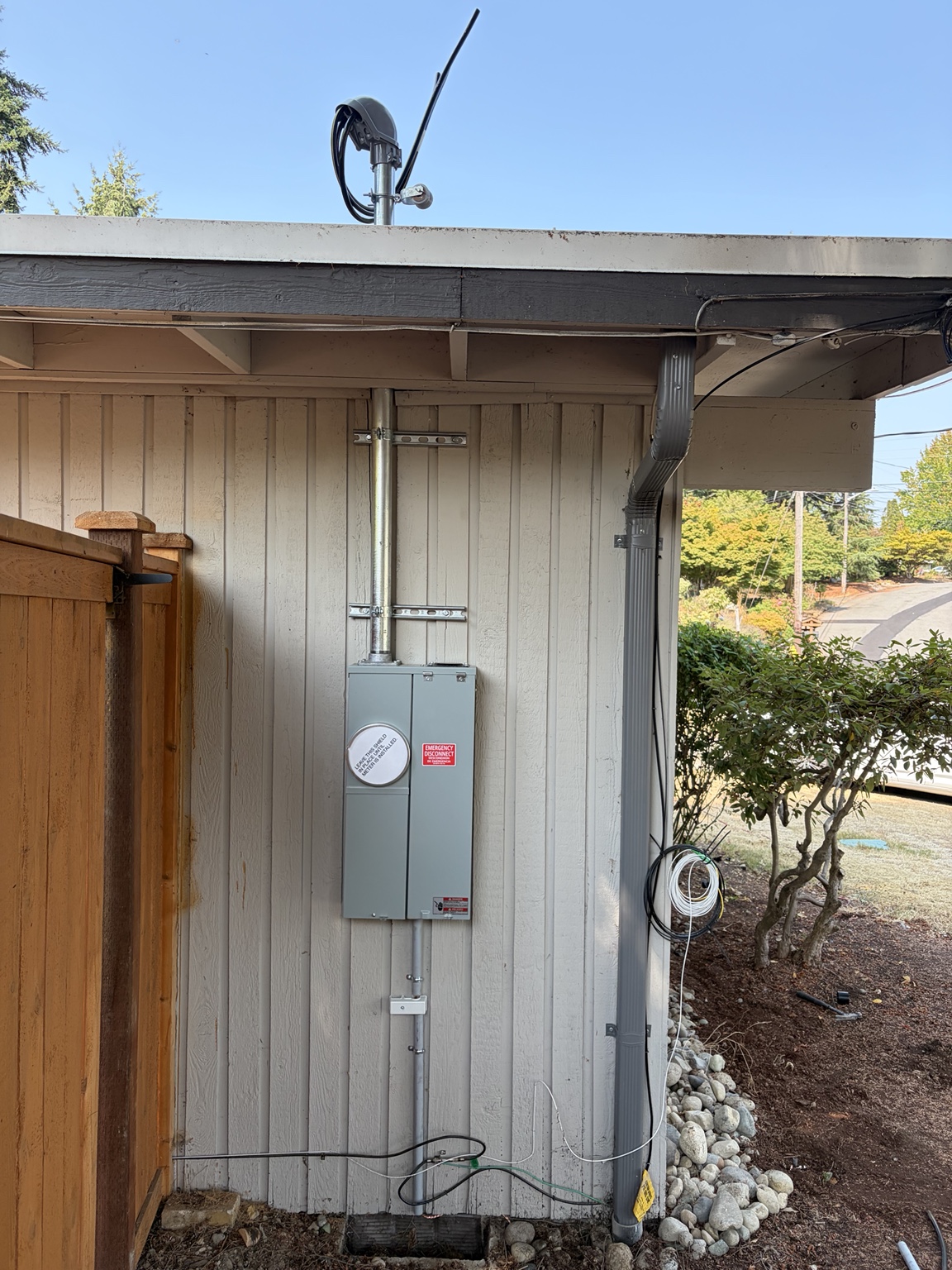 Relocated meter and new service mast after the Bellevue 200A upgrade